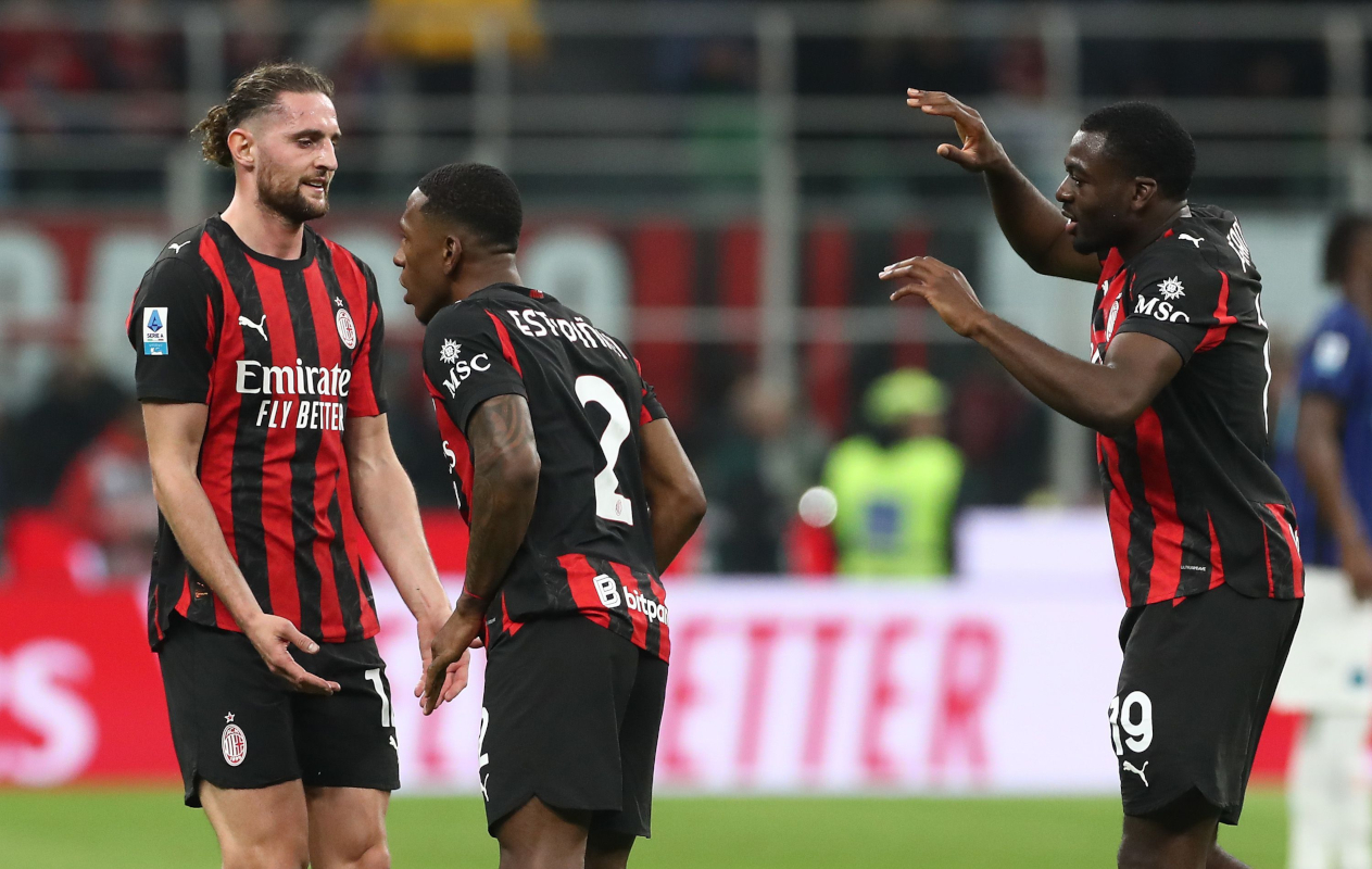 MILAN, ITALY - MARCH 08: Pervis Estupinan of AC Milan celebrates celebrates with his team-mates Adrien Rabiot and Youssouf Fofana after scoring their team's team's first goal during the Serie A match between AC Milan and Inter at Giuseppe Meazza Stadium on March 08, 2026 in Milan, Italy. (Photo by Marco Luzzani/Getty Images)